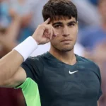 Carlos Alcaraz celebrates winning his second consecutive Indian Wells title in 2024